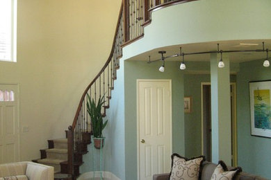 Inspiration for a large modern open concept limestone floor and beige floor living room remodel in Boise with a music area, green walls, no fireplace and a wall-mounted tv