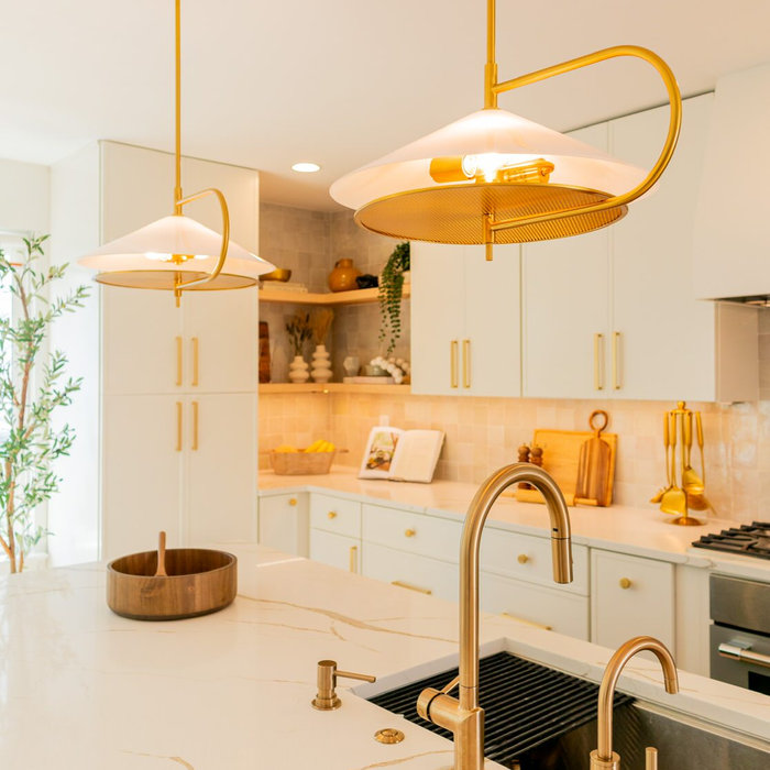 There are so many beautiful details to appreciate in this transitional/contemporary kitchen. We knocked down 3 walls to create a fully open-concept kitchen with the living and dining room. This really