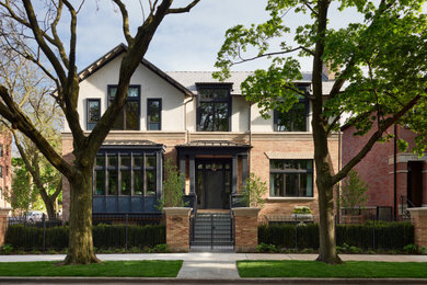 Example of a transitional home design design in Chicago