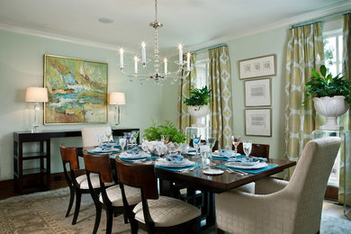 Inspiration for a mid-sized tropical dark wood floor kitchen/dining room combo remodel in Other with green walls