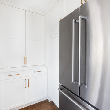 Painted Maple Pantry Wall Beside Stainless Refrigerator