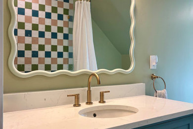 Inspiration for a small eclectic kids' multicolored tile and ceramic tile porcelain tile, white floor and single-sink bathroom remodel in Other with shaker cabinets, blue cabinets, a two-piece toilet, green walls, an undermount sink, quartz countertops, white countertops and a freestanding vanity