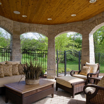 Stone Gazebo with Stained Bead Board Ceiling and Paver Hardscapes