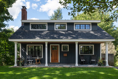 Mid-sized transitional blue two-story mixed siding and board and batten house exterior idea in Boston