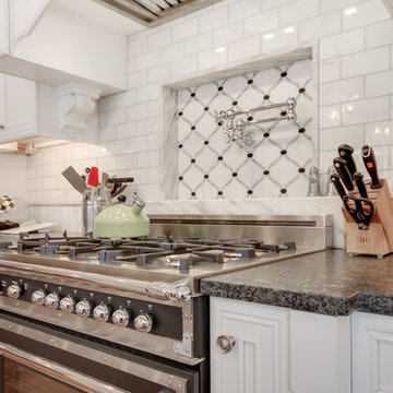 Mont Blanc Quartzite & Silver Pearl Granite in a White Kitchen
