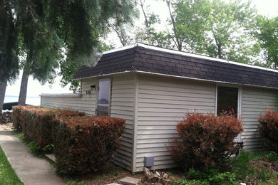 Example of a large trendy detached boathouse design in Other
