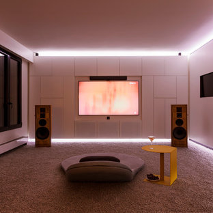 Home theater - contemporary home theater idea in Paris