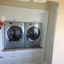 Contemporary Laundry Room with Raised Washer Dryer and Drawer Slides