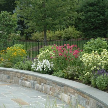 Butterfly garden atop wall at pool