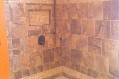 Inspiration for a craftsman doorless shower remodel in Cleveland