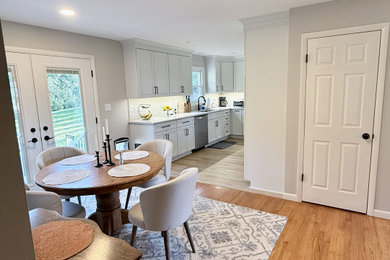 Inspiration for a light wood floor dining room remodel in Baltimore