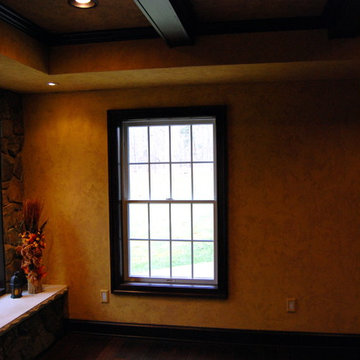 Olde English Aged Plaster Finish throughout an entire Lower Level in Virginia