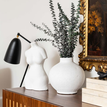 Modern Decorative Vignette With Sculptural Vase & Black Accent Lamp