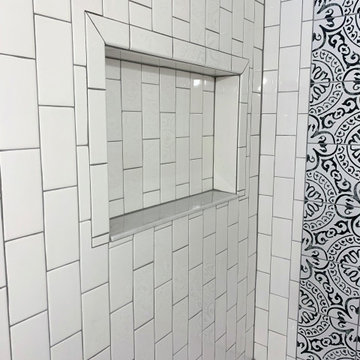 Black & white patterned tile bathroom