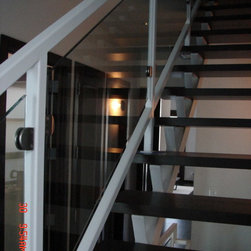 Steel stairs with glass panel - Products