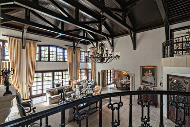 Example of a tuscan living room design in Miami