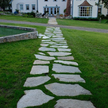 Irregular Granite Walkway with Grass Joints From Pool To House