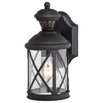 Vaxcel - Henderson 1 Light Black Motion Sensor Dusk to Dawn Outdoor Wall Lantern - The Henderson Dualux traditional outdoor wall lantern is finished in textured black with clear glass. Featuring patented dual-level outdoor LED security lighting functionality designed to fit your home's style. It enables you to enhance the beauty, safety, and usability of your home's exterior areas while enjoying the comfort and convenience of continuous bright illumination during the early evening hours with automatically dimming late at night to provide soft, ambient illumination until dawn. Rest assured knowing that whenever motion is detected, on-demand bright illumination will be triggered to keep your property safe and secure. Ideal for your porch, entryway, garage, or other outdoor areas around your home. This fixture works with any dimmable bulb and many dimmable LED bulb models.