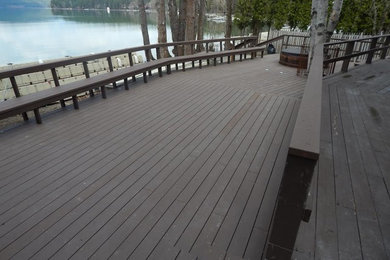 Deck - large traditional backyard deck idea in Other with no cover