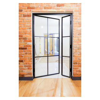 Industrial-style steel doors with an opening panel - Industrial - Hall ...