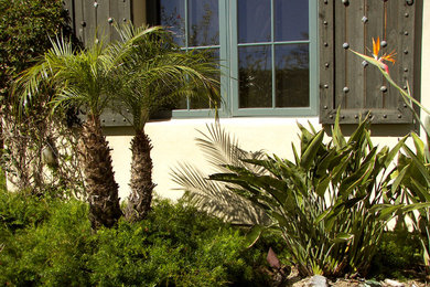 Example of a tuscan exterior home design in San Diego