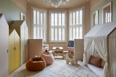 Design ideas for a large modern gender-neutral kids' playroom for kids 4-10 years old in London.