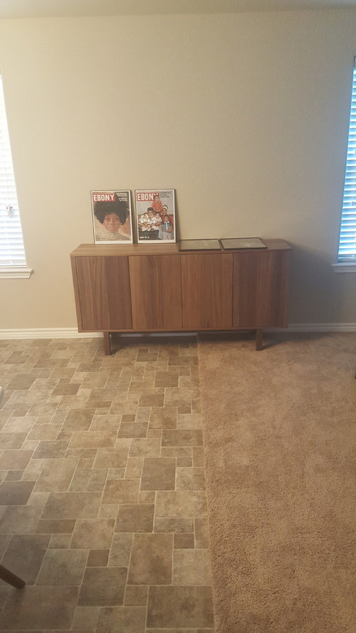 How high should I hang my pictures