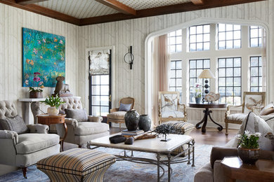 Large eclectic formal and enclosed medium tone wood floor living room photo in Columbus with multicolored walls