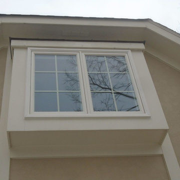 New Andersen Windows 400 Series with colonial pine window trim