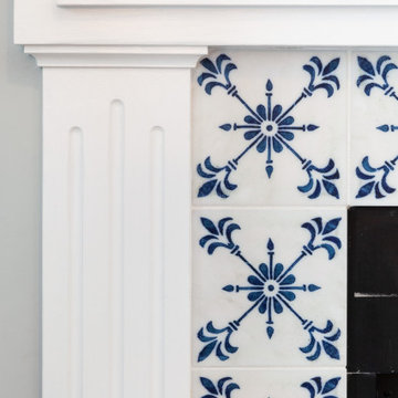 White Fireplace with Blue Pattern Tile Surround and Built-In Shelving – Ipswich