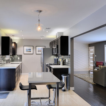 Monochromatic kitchen and two-seater table