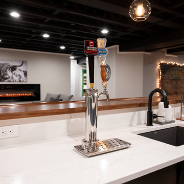 Finished Basement with Irish Themed Bar, Gym, Bathroom and Gamer Area in Canton,