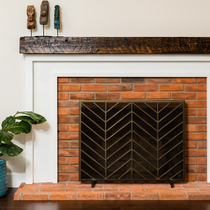 This mantle (and surround) was created by a local woodsmith and artist with wood reclaimed from a Detroit Fire Station in Downtown Detroit Michigan. Each piece is numbered and registered, giving a lit
