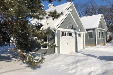 Inspiration for a craftsman detached two-car garage workshop remodel in Cedar Rapids