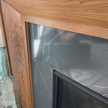 Angled Kitchen Design with Slab Style Cabinets in Pecan Stain