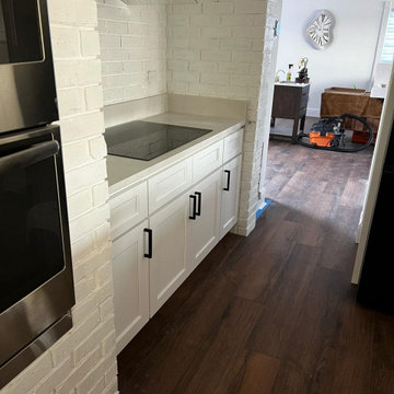 **Complete Kitchen, Flooring, Complete Stair Case and Trim