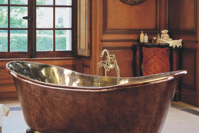 Inspiration for a large timeless master marble floor freestanding bathtub remodel in Miami with furniture-like cabinets and medium tone wood cabinets