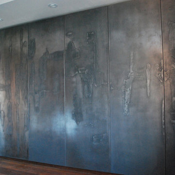 Industrial living room with large cement tiles on walls