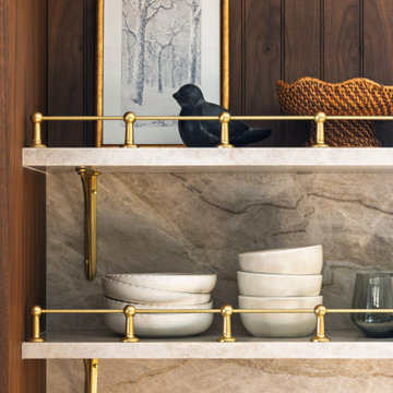 Elegant Two-Tone Kitchen with Walnut Cabinetry and Statement Stone Backsplash
