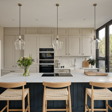 Elegant Grey Shaker kitchen with island in Aldersbrook, East London