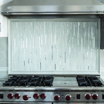 Glass and handmade tiles backsplash