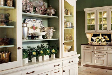 Eat-in kitchen - mid-sized traditional u-shaped ceramic tile eat-in kitchen idea in Jackson with recessed-panel cabinets, a double-bowl sink, white cabinets, quartzite countertops, beige backsplash, ceramic backsplash, stainless steel appliances and two islands