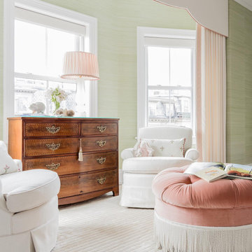 Experience luxury and glamour with this pink velour fringe ottoman