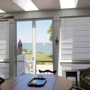 Outdoor shades protect your screen porch.