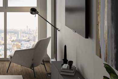 Зона гостиной с ТВ, камином и зоной отдыха у панорамного окна