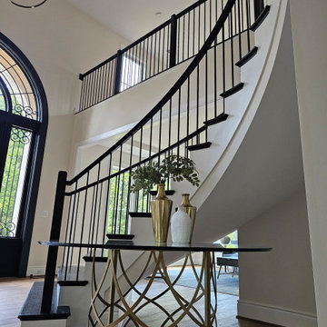 Project #130 | Curved Staircase with Wraparound Balcony