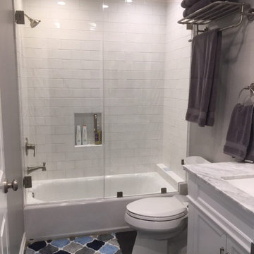 Clean White Bathroom with Separate Bath