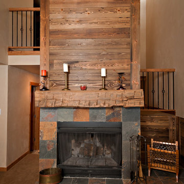 A fireplace anchors a remodel.