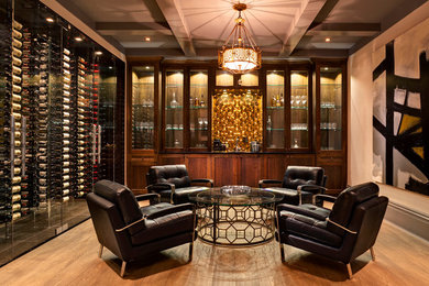 Design ideas for a large transitional wine cellar in Vancouver with medium hardwood floors, storage racks and beige floor.
