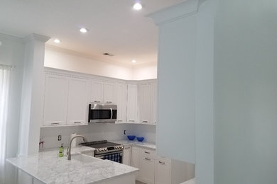 Transitional kitchen photo in Miami